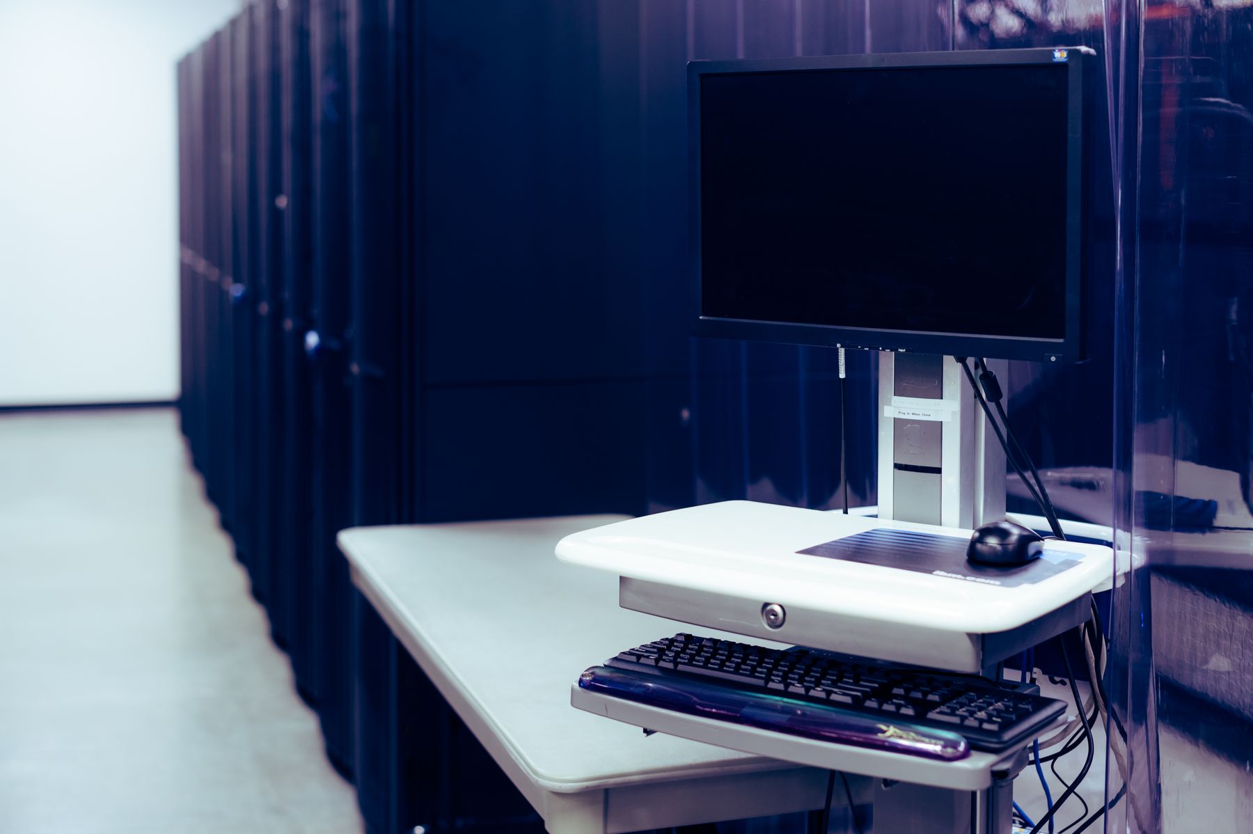 Infrastructure console inside a data center server row